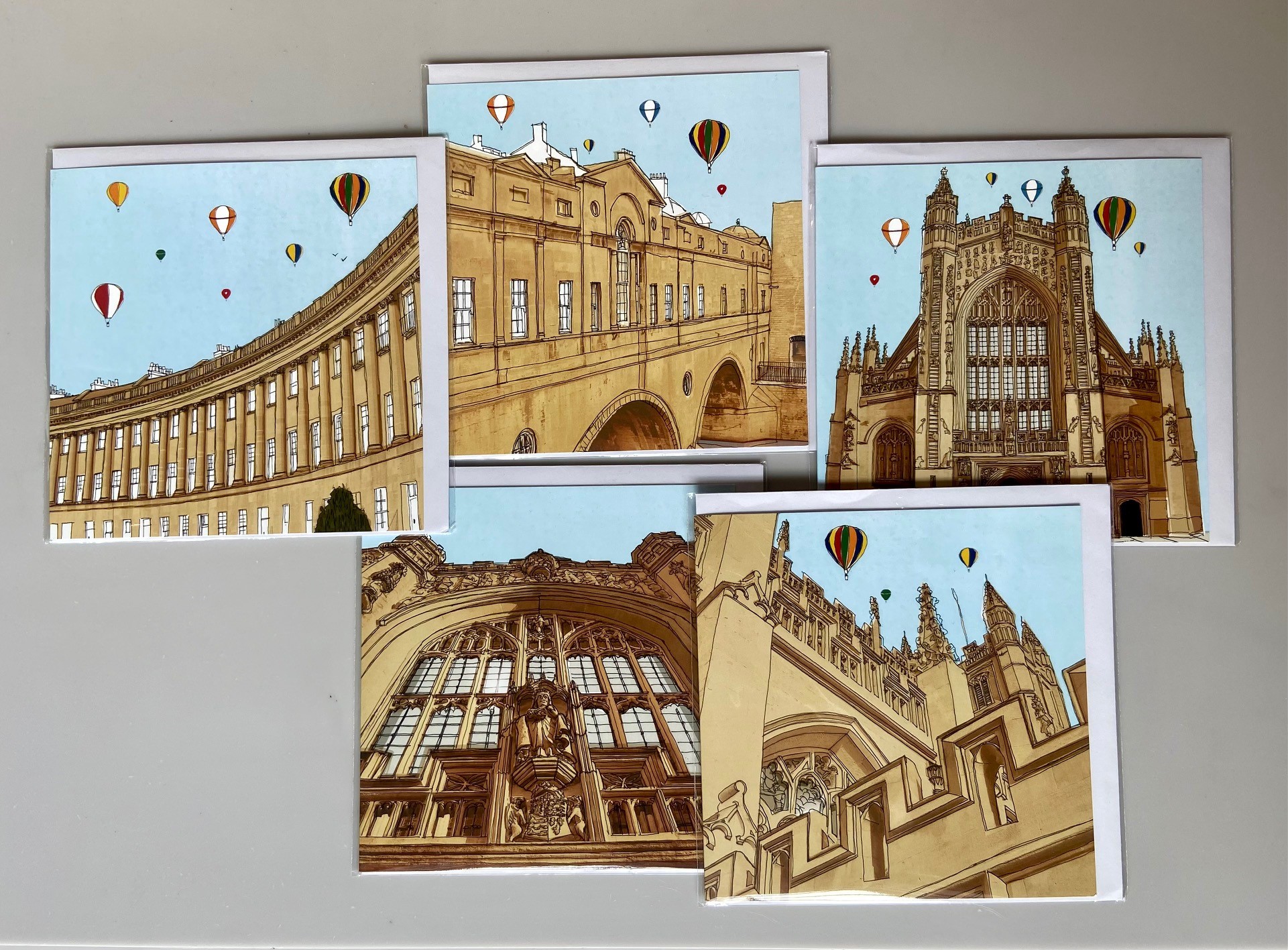 Suzy Furze Greeting Cards showing illustrated views of No 1. Royal Crescent, three different views of Bath Abbey and Pulteney Bridge
